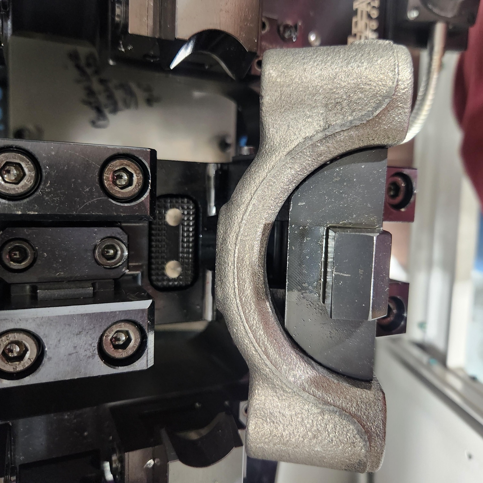 Close-up showing fixture interaction point used to diagnose hang-up condition.